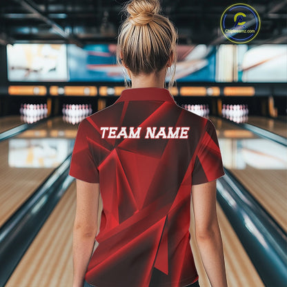 Person wearing a red bowling shirt with 'TEAM NAME' on the back in a bowling alley.