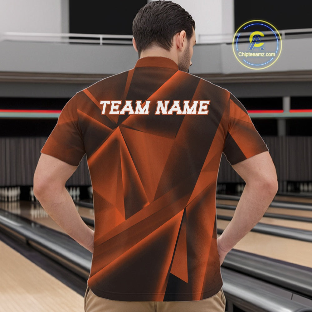 Man wearing a bowling shirt with 'TEAM NAME' on the back in a bowling alley.
