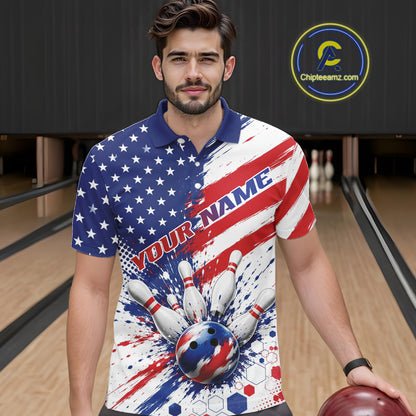 A man wearing a custom bowling-themed polo shirt with a red, white, and blue patriotic design featuring stars, stripes, a bowling ball, and pins. He is standing in a bowling alley holding a bowling ball