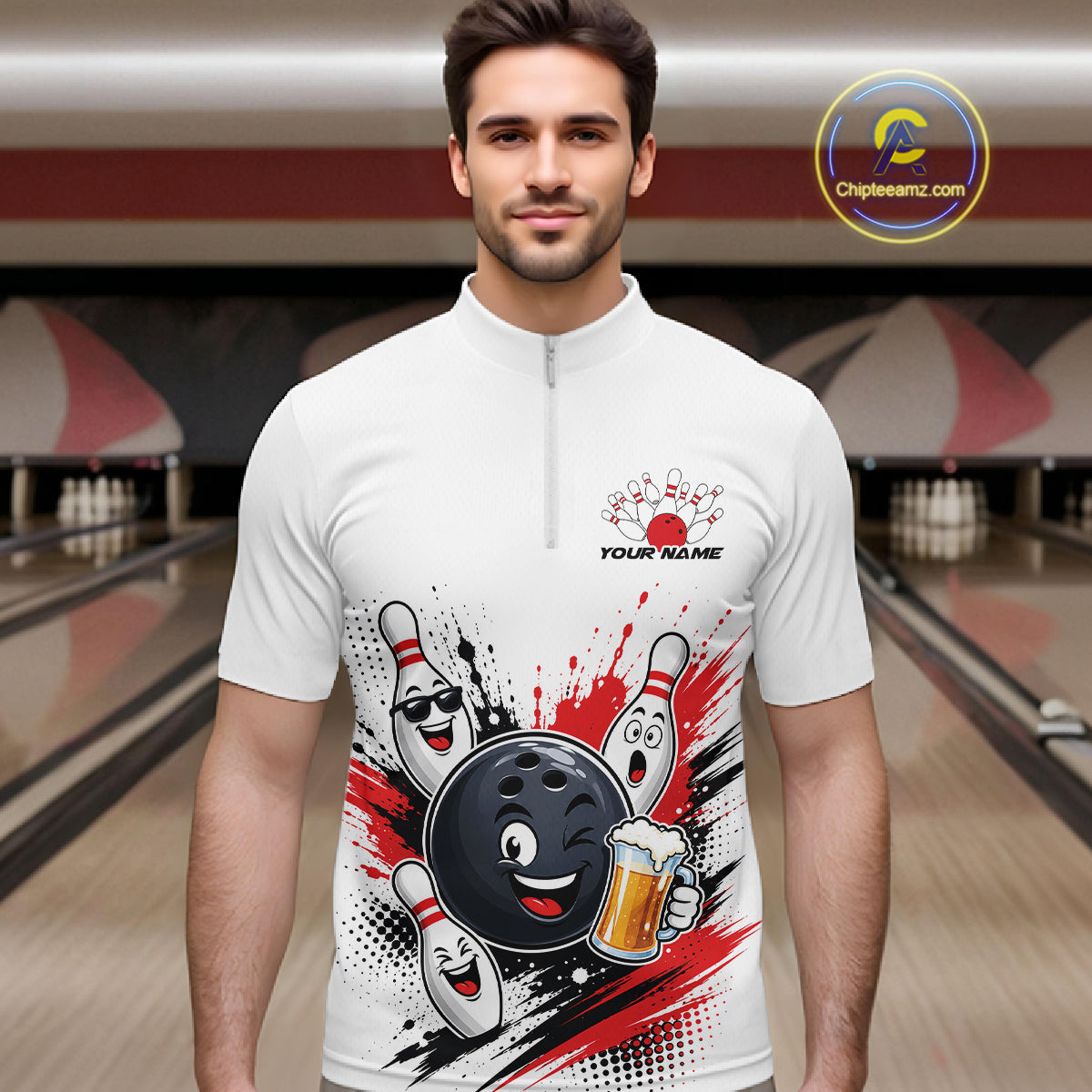 A man wearing a white short-sleeve quarter-zip bowling graphic shirt with cartoon bowling pins, a bowling ball, and a beer mug, set against a blurred bowling alley background. 