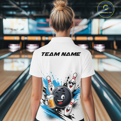 A woman viewed from behind wearing a white bowling-themed short-sleeve polo shirt with a large cartoon bowling ball and pins graphic on the back, standing in a bowling alley.