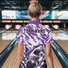 Load image into Gallery viewer, Person wearing a purple and white bowling shirt with a shark design and 'TEAM NAME' text in a bowling alley.