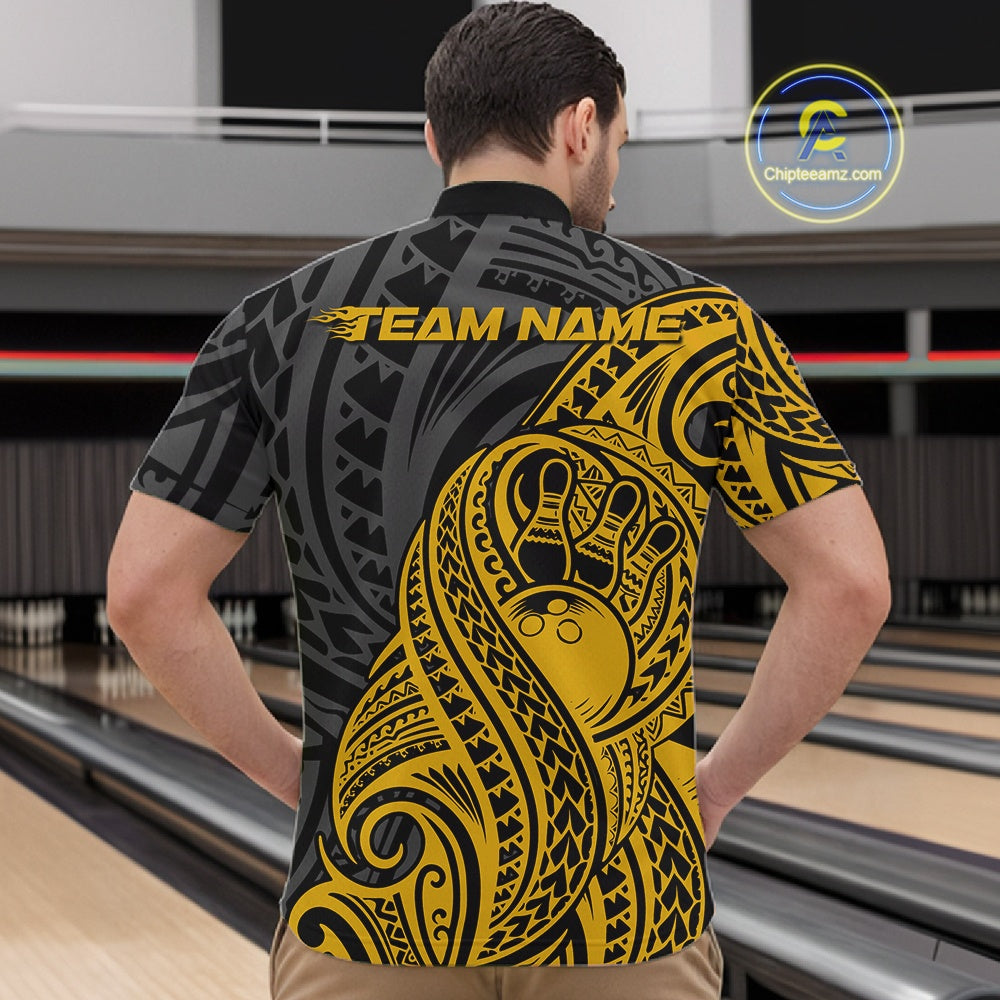 Man wearing a black and yellow bowling quarter zip shirt featuring tribal pattern bowling design