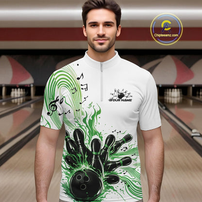 Male model wearing a white and green bowling quarter-zip shirt at the lane with musical wave graphics and bowling strike artwork.