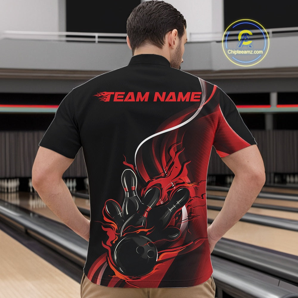 Male model front view in bowling alley wearing black and red quarter zip shirt with flaming bowling ball striking pins graphics