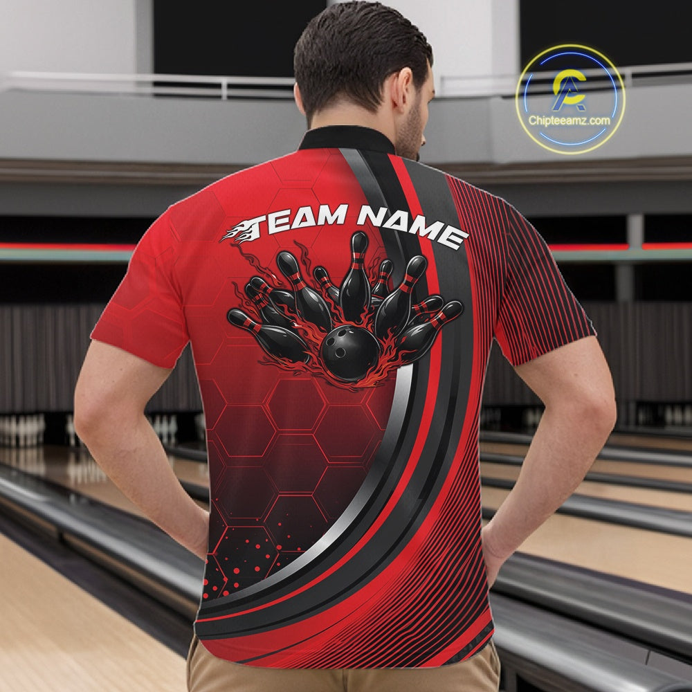 Male model at a bowling lane wearing a black and red quarter zip shirt featuring honeycomb pattern and a dynamic flame bowling ball hitting pins design.