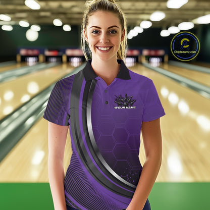 Female model in a bowling alley wearing a black and purple polo shirt with honeycomb accents and a dynamic flame bowling strike illustration.