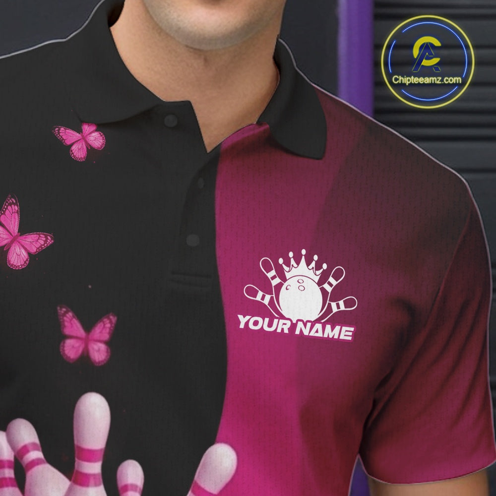 Close-up of the left chest area of a bowling polo shirt in black and pink, featuring breast cancer awareness ribbons, butterflies, and bowling graphic details.