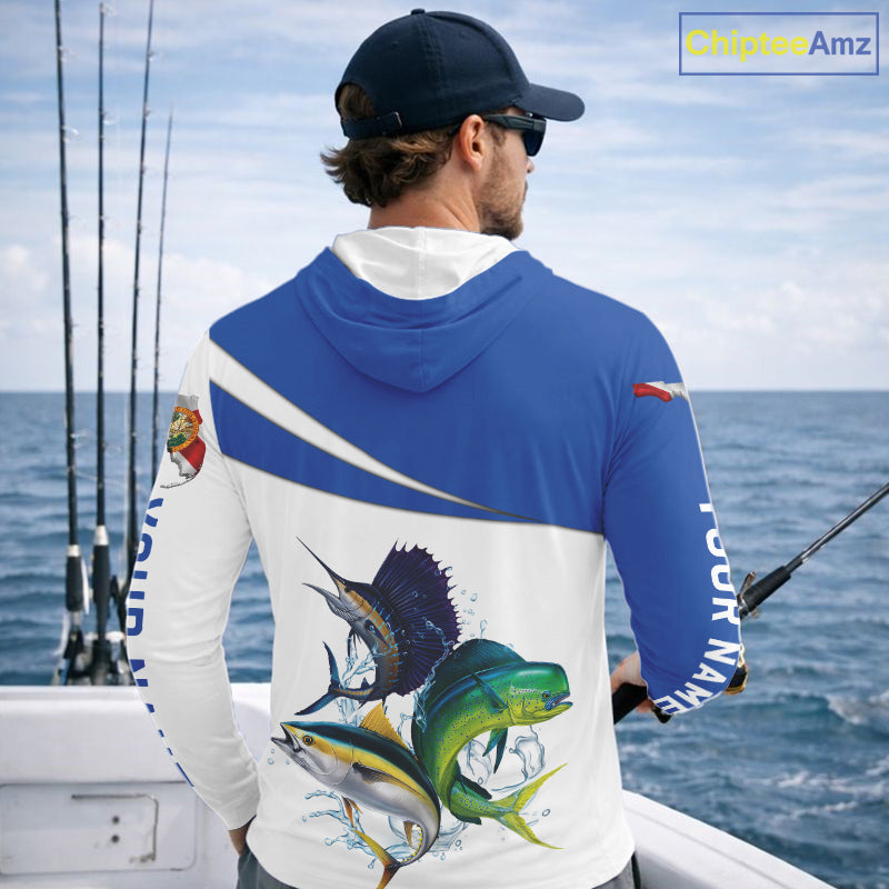 Man on a boat wearing a blue and white fishing hoodie with Mahi Mahi, Sailfish, Tuna fish designs