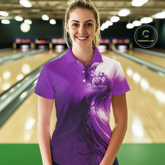 Female model in a purple bowling polo shirt featuring butterfly accents and bowling graphics at the bowling lane.