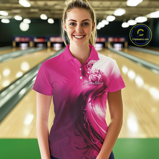 Front view of a female model in a pink bowling polo featuring butterfly artwork and colorful bowling graphics