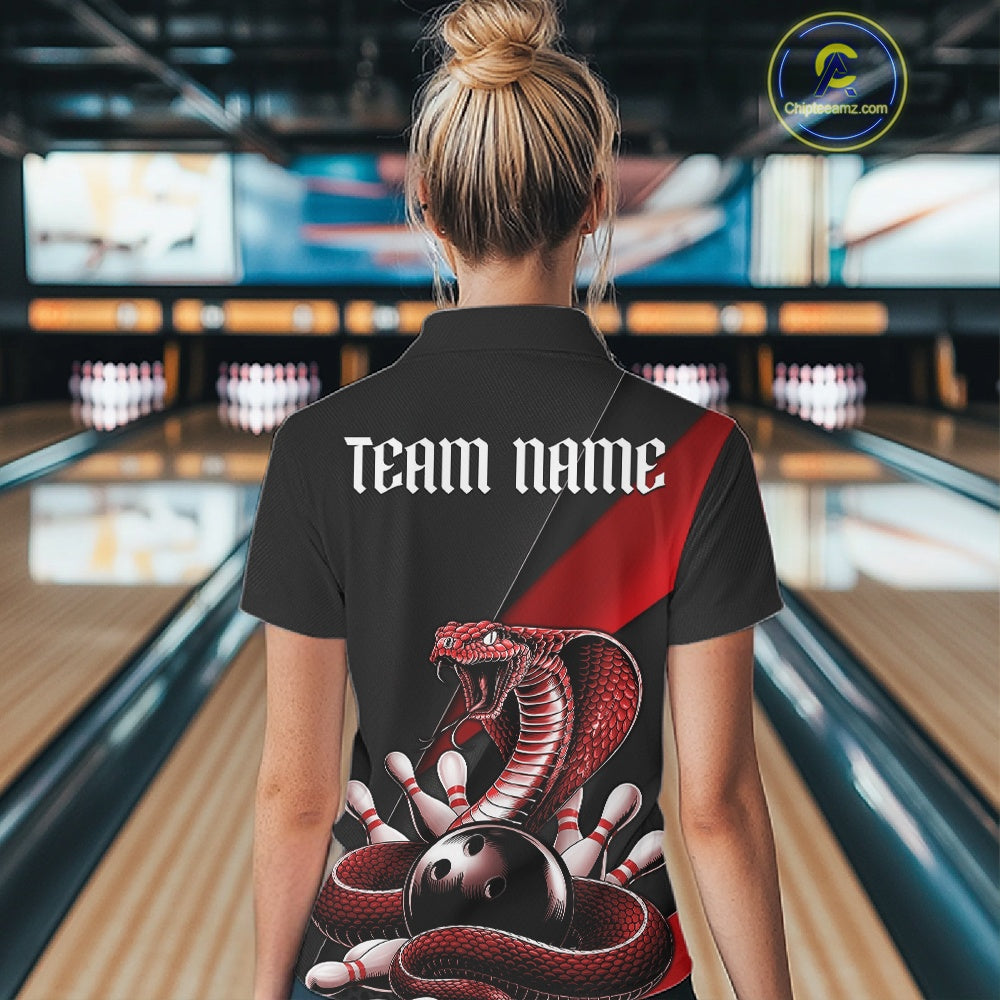 Back view of a black womens quarter-zip showcasing a red cobra wrapped around a bowling ball with scattered pins.