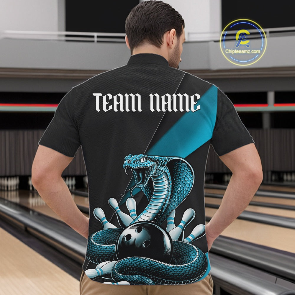 Front view of a black mens quarter-zip displaying a blue cobra wrapped around a bowling ball with scattered pins.