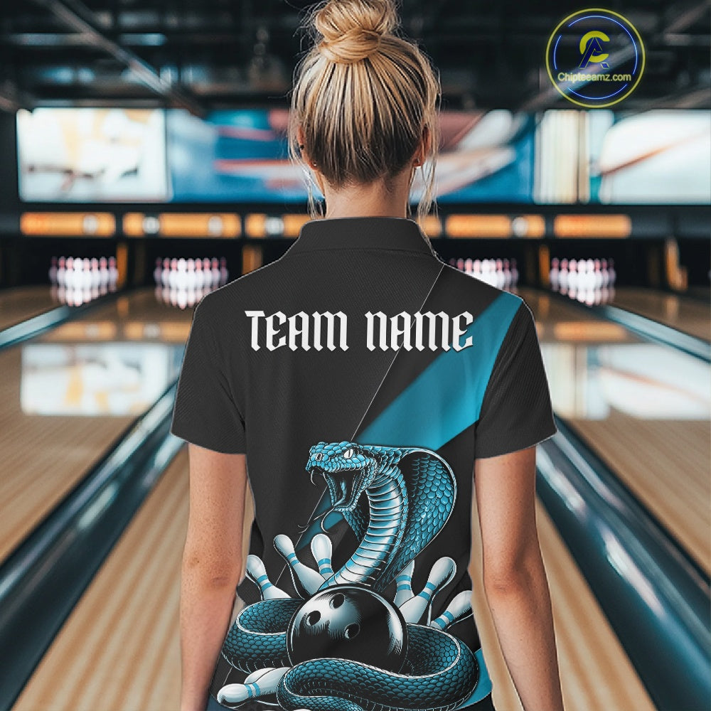 Back view of a black bowling quarter-zip displaying a blue cobra coiled around a bowling ball with scattered pins.