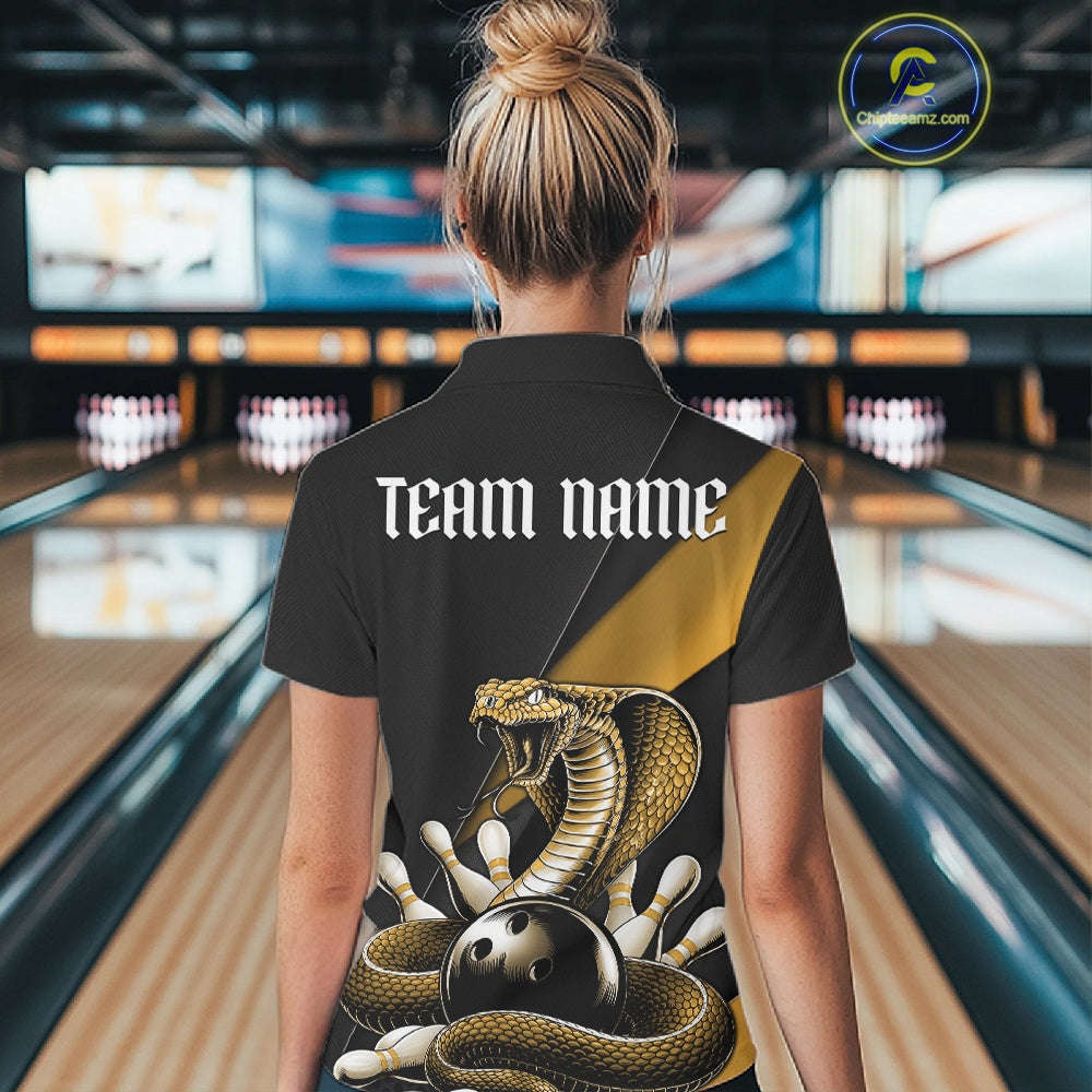 Back view of a black bowling quarter-zip displaying a yellow cobra wrapped around a bowling ball with scattered pins.