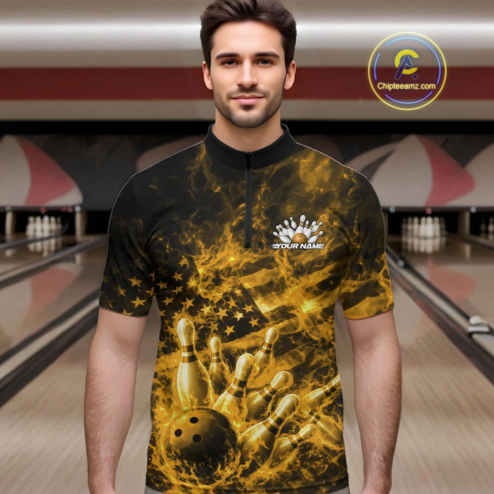 Male model wearing a black and yellow quarter-zip at the bowling lane with fiery bowling action artwork and flag-inspired accents.