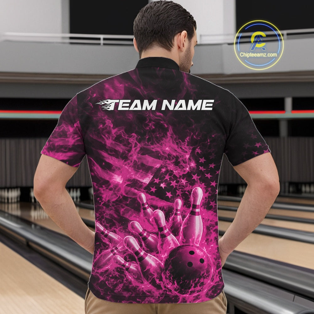Front view of a black and pink bowling quarter-zip displaying a bowling strike scene with flames and flag-inspired accents.