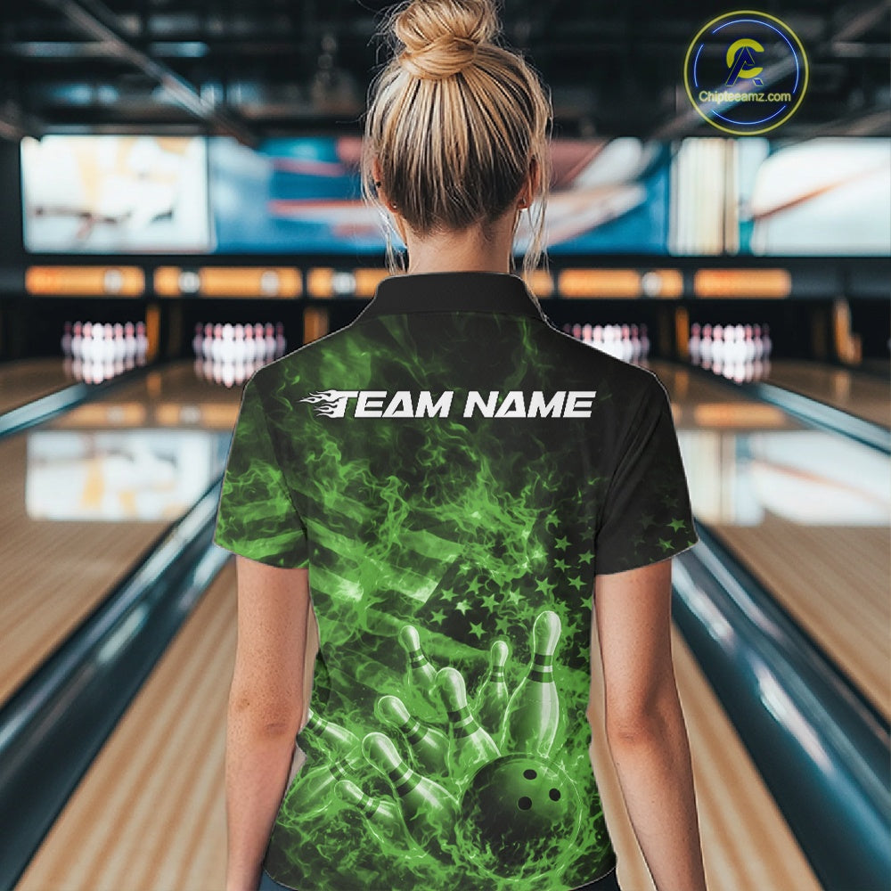Back view of a black and green womens quarter-zip displaying a bowling ball, pins, flames, and American flag motif.