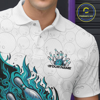 Left chest close-up of a white and turquoise blue bowling polo with flaming bowling ball and pins artwork.