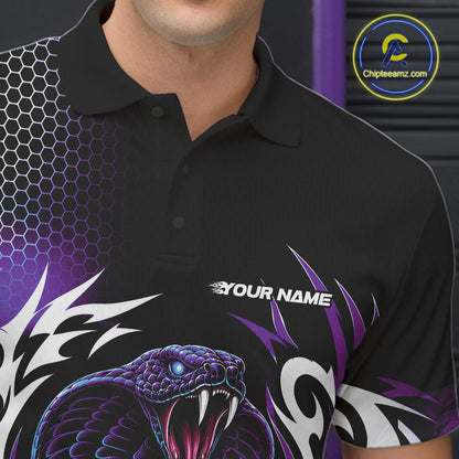 A close-up of a black short-sleeve polo shirt worn by a model, featuring a purple and white tribal snake graphic on the front, a purple hexagonal pattern on the right shoulder, and a circular 