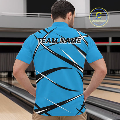 Front view of a male bowler in a bowling alley wearing a blue, black, and white bowling quarter zip shirt with an athletic jersey pattern