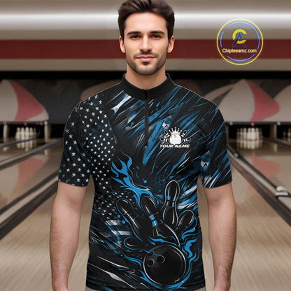 Male model wearing a black and blue bowling quarter-zip shirt at a bowling lane with fiery bowling action graphics and patriotic details.