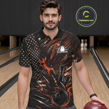 Male model wearing a black and orange bowling polo shirt at a bowling lane with fiery bowling action artwork and American flag accents.