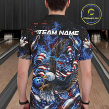 Load image into Gallery viewer, Back view of a male model at a bowling lane wearing a bowling polo shirt with flaming bald eagle, blue bowling ball, American flag, and blue flames.