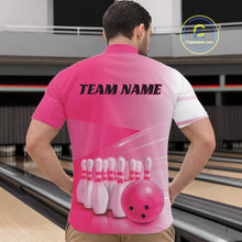 Load image into Gallery viewer, Male model front view at the bowling lane wearing a bowling quarter zip shirt with bowling ball and pins arranged across a pink gradient layout.