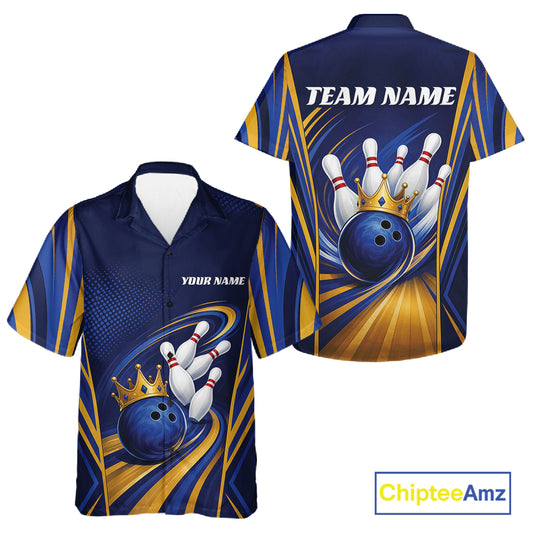 Front and back views of a short-sleeve bowling-themed button-up shirt on a white background. The shirt features a dark blue base with gold and yellow abstract streaks, a bowling ball and pins graphic, and customizable text placeholders 'YOUR NAME' on the front chest and 'TEAM NAME' on the back.