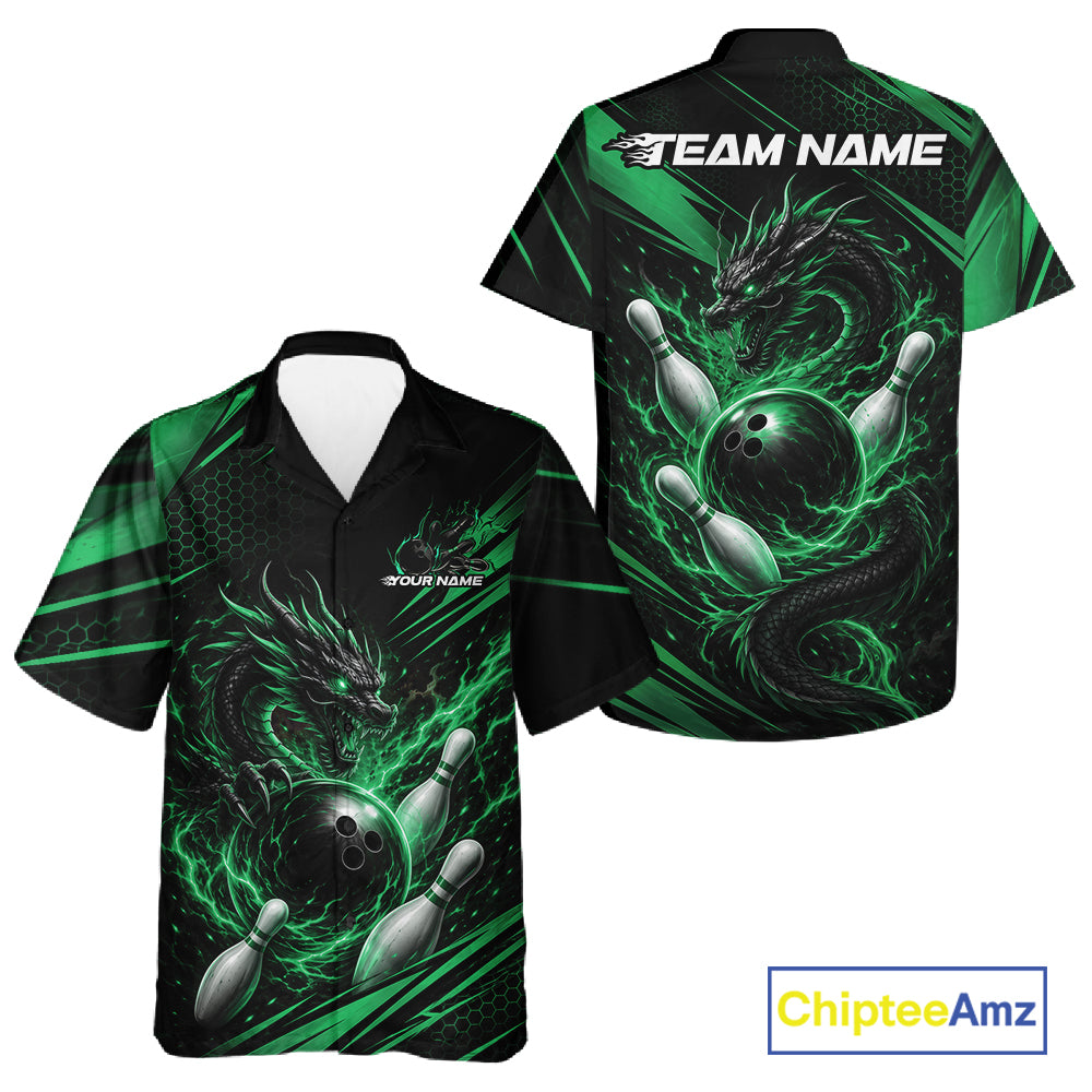 Front and back views of a short-sleeve bowling button-up shirt on a white background. The shirt features a black base with vibrant green dragon and lightning graphics, bowling pins, and bowling balls, with customizable text placeholders 'TEAM NAME' and 'YOUR NAME'.
