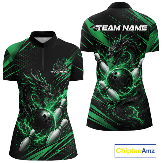 Front and back views of a women's short-sleeve quarter zip shirt with a black base and vibrant green graphic print featuring a dragon, bowling ball, and bowling pins.