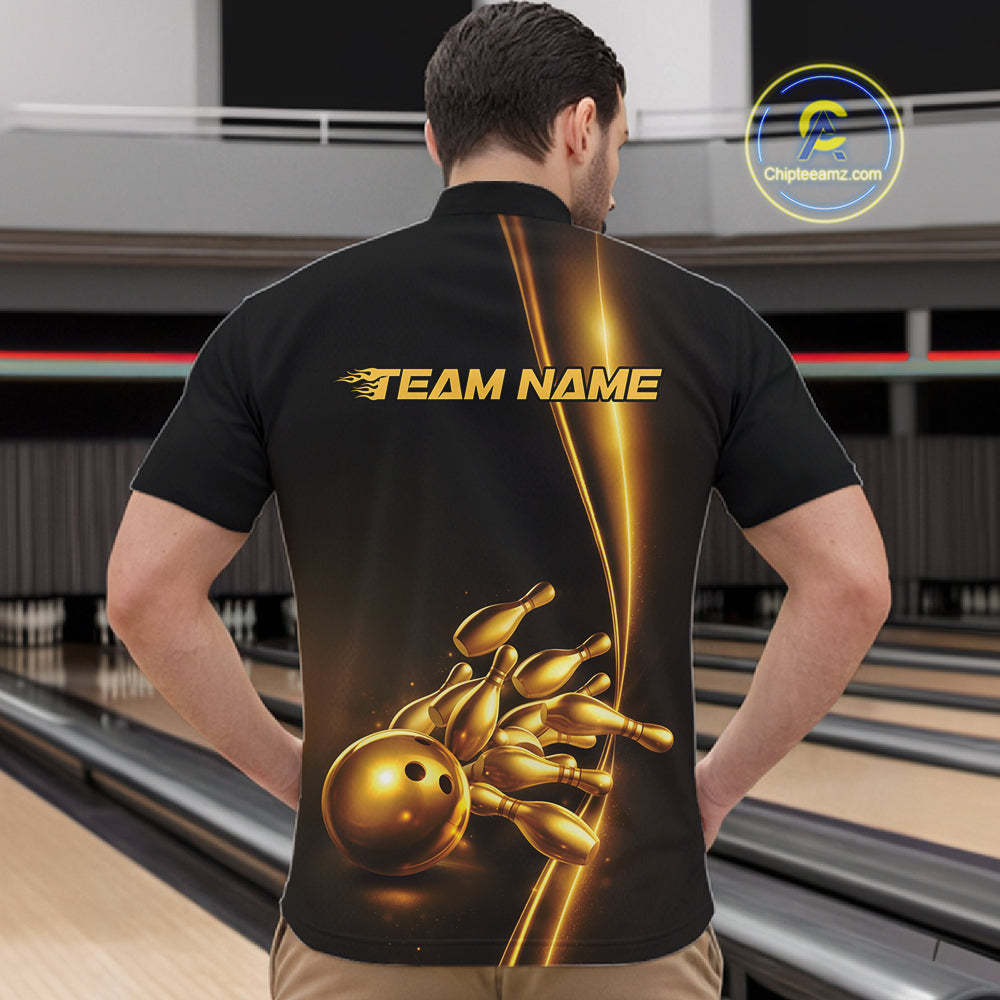 Front view of a male model in a bowling lane wearing a black quarter-zip shirt featuring golden bowling ball and pins design with sleek sporty styling.