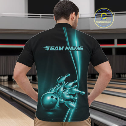 Front view of a male model in a bowling lane wearing a black quarter-zip shirt with turquoise blue bowling ball and pins design and clean athletic bowling graphics.