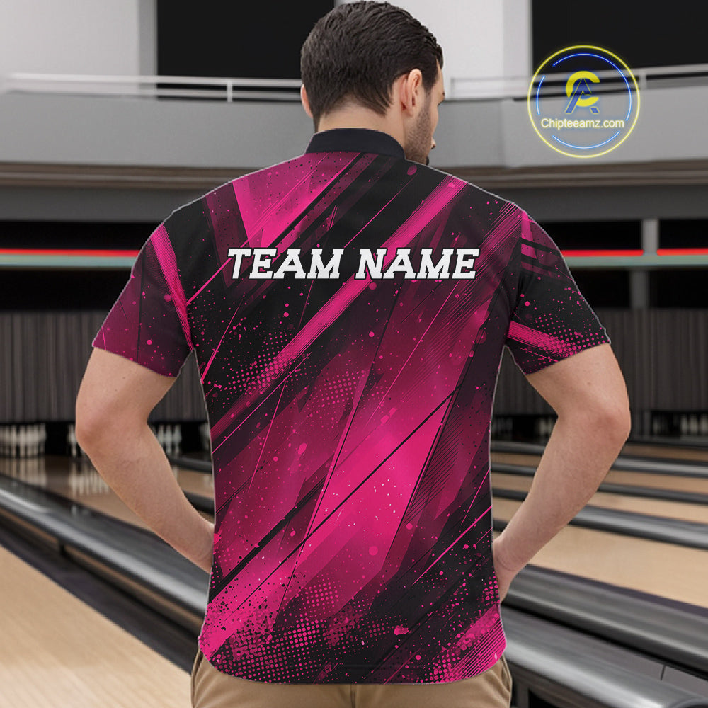 Person wearing a pink and black bowling shirt with 'TEAM NAME' text on a bowling alley.