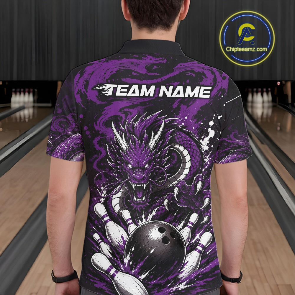 Person wearing a bowling-themed shirt with a purple dragon design in a bowling alley.
