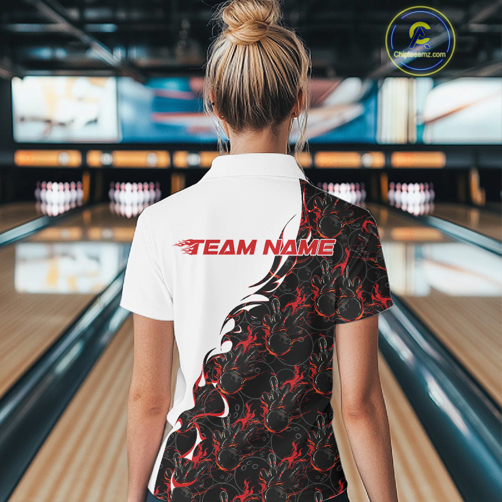 Back view of a female model in a bowling lane wearing a white quarter-zip shirt with red and black flame bowling pattern and bold athletic bowling visuals.