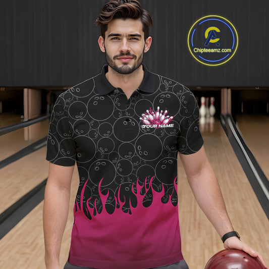 Front view of a male model in a bowling lane wearing a black polo shirt with vibrant pink flames and bowling ball pattern with dynamic bowling strike visuals.