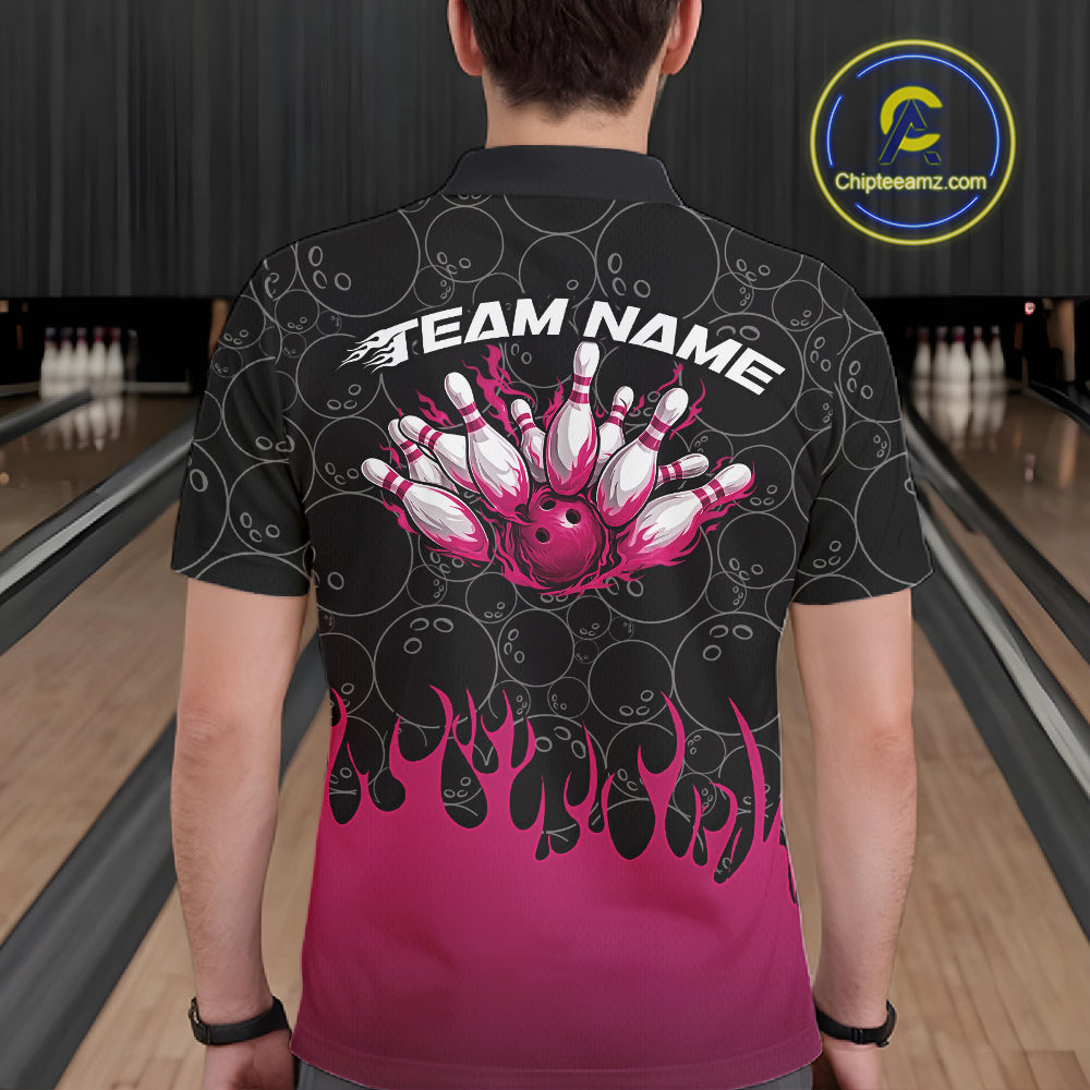 Back view of a male model in a bowling lane wearing a black polo shirt featuring vibrant pink flames and bowling ball pattern with energetic sports styling.