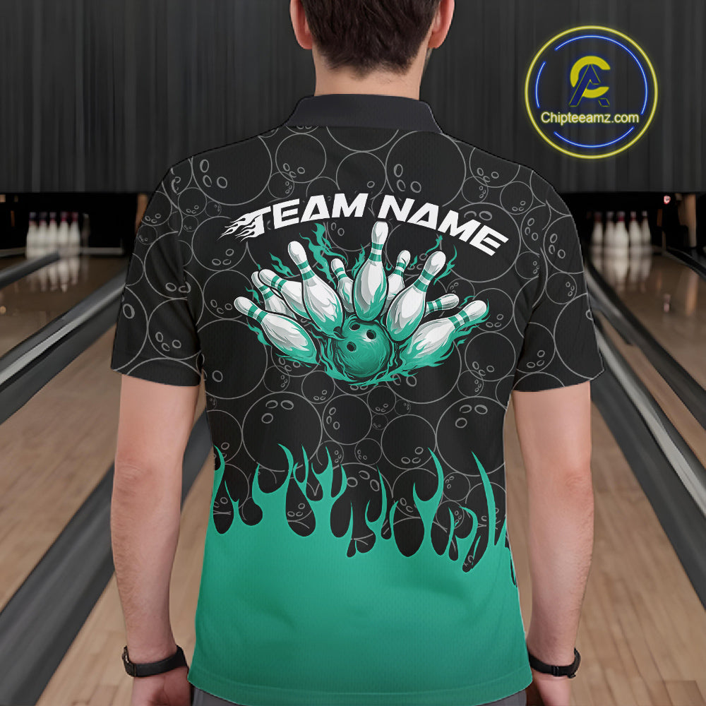 Back view of a male model in a bowling lane wearing a black polo shirt with vibrant turquoise green flames rising and bowling ball pattern with flaming bowling design.