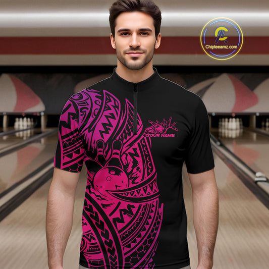 Male model wearing a black and pink bowling quarter-zip shirt at the bowling lane with Polynesian-inspired bowling graphics.
