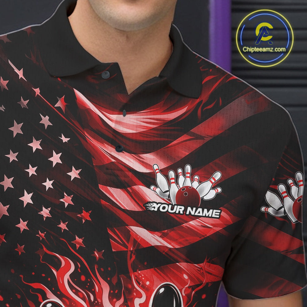 Left chest close-up of a black bowling polo shirt featuring red flame bowling artwork and flag-themed graphics.