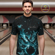 Load image into Gallery viewer, Male model in a black and turquoise blue bowling quarter-zip shirt at the lane with glowing butterfly strike graphics.