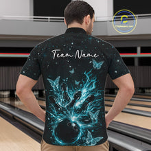 Load image into Gallery viewer, Front view of a male model wearing a black and turquoise blue quarter-zip shirt with cosmic bowling motifs.