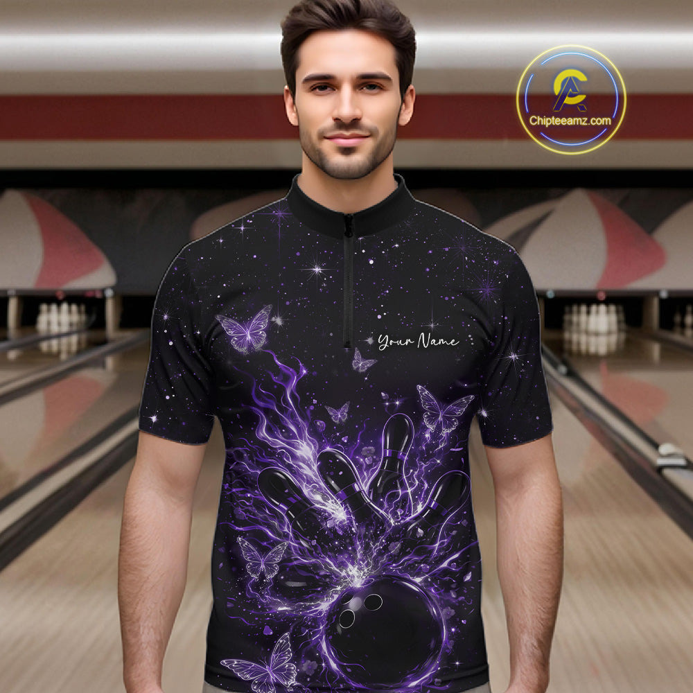 Male model in a black and purple bowling quarter-zip shirt at the lane with cosmic bowling strike graphics.