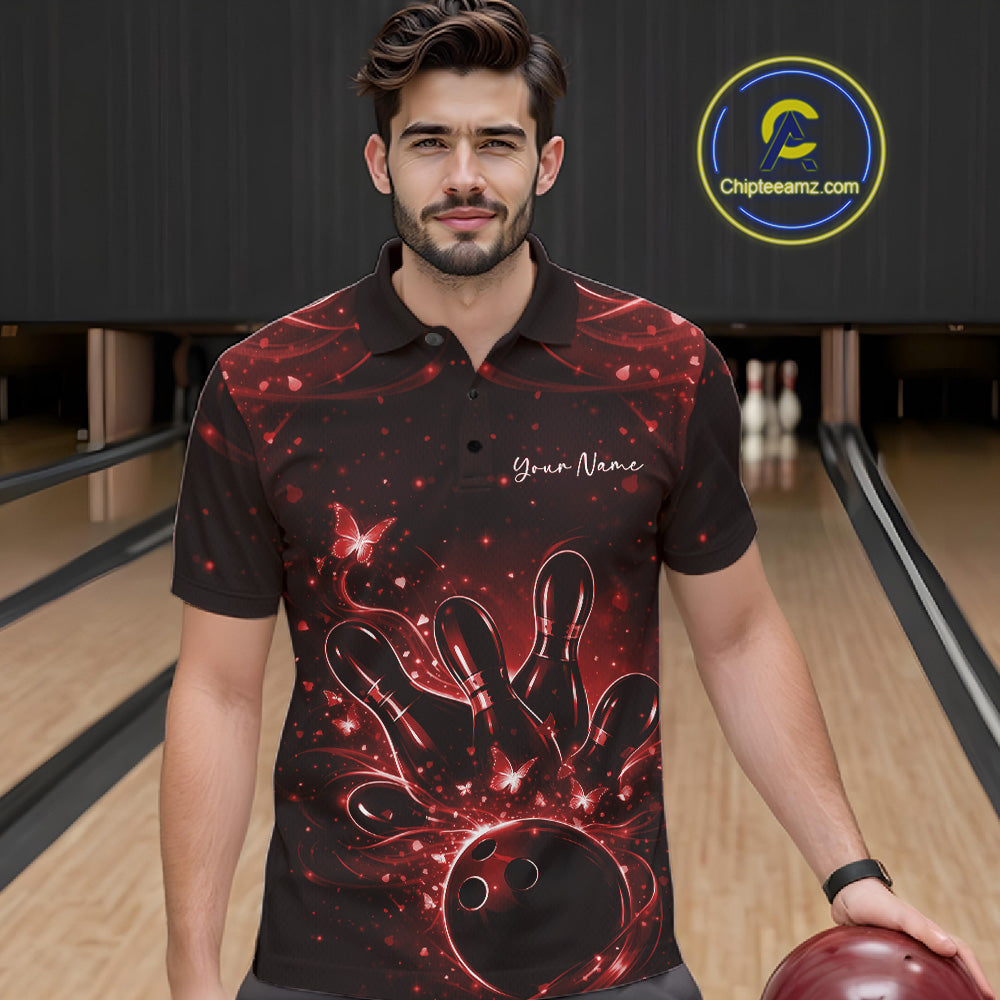 Male model in a black and red bowling polo shirt at the lane with butterfly-accented bowling artwork.