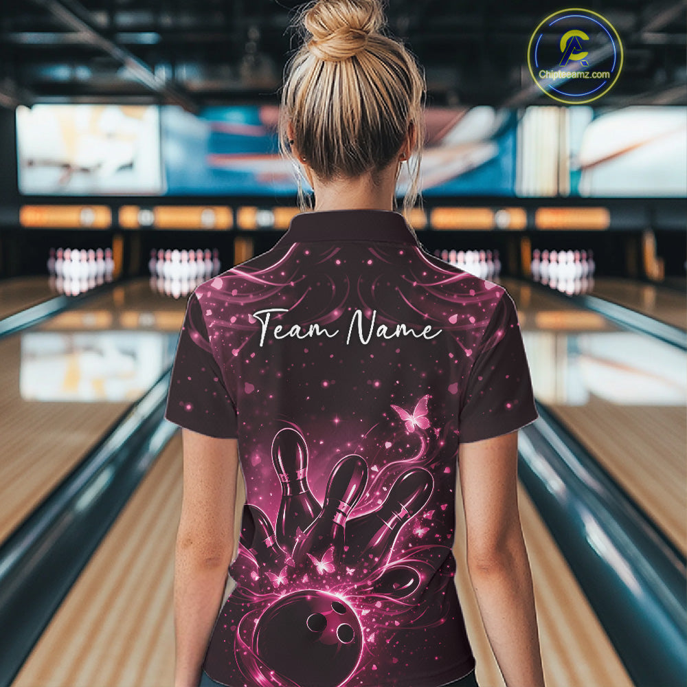 Back view of a female model displaying a black and pink bowling quarter-zip shirt with butterfly and bowling pin graphics.