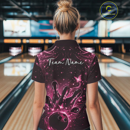 Back view of a female model displaying a black and pink bowling quarter-zip shirt with butterfly and bowling pin graphics.