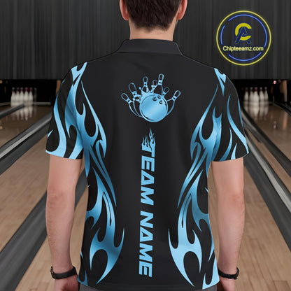 Male model seen from the back in a bowling lane wearing a black polo shirt featuring a blue gradient tribal flame bowling ball striking pins in a dynamic sports motion design.