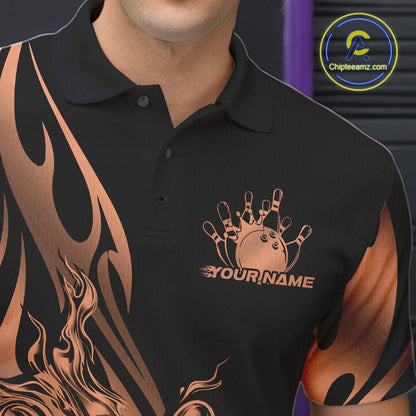 Close-up view of the left chest area of a black polo shirt showing a rose gold gradient tribal flame bowling ball and pins design detail.